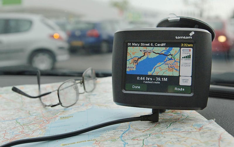 A tomtom satellite navigation on the dashboard of a car (Barry Batchelor/PA)
