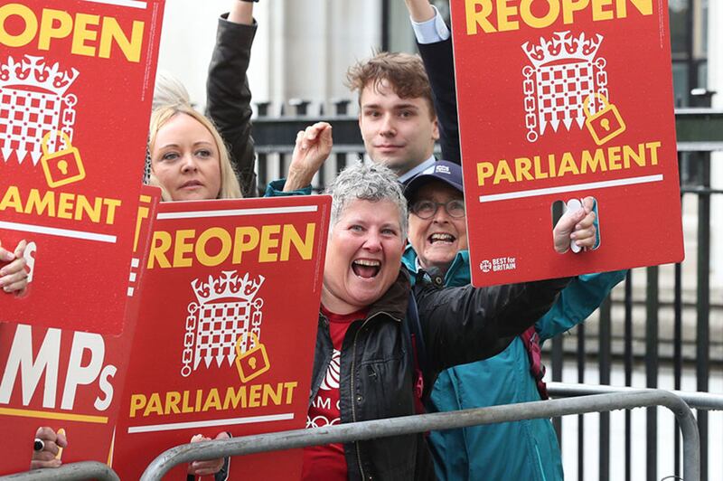Protesters celebrating outside the Supreme Court in London, where judges have ruled that British Prime Minister Boris Johnson's advice to the Queen to suspend Parliament for five weeks was unlawful. Picture by&nbsp;Jonathan Brady/PA Wire&nbsp;