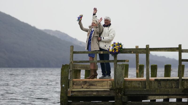 His daughter Gina laid flowers on Coniston Water as the jets roared overhead.