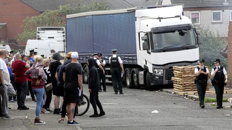 Contractors, accompanied by police, arrived at the site on London Road to remove the tyres 