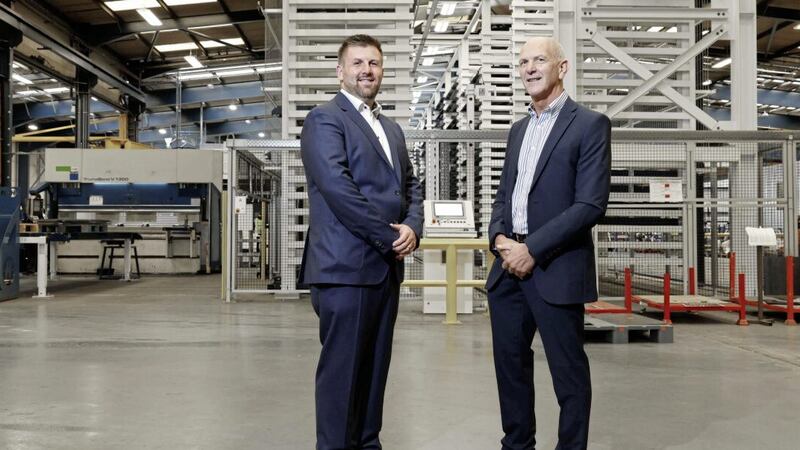 Mark Hutchinson, chief executive of Hutchinson Engineering (left) with Invest NI&#39;s George McKinney. 