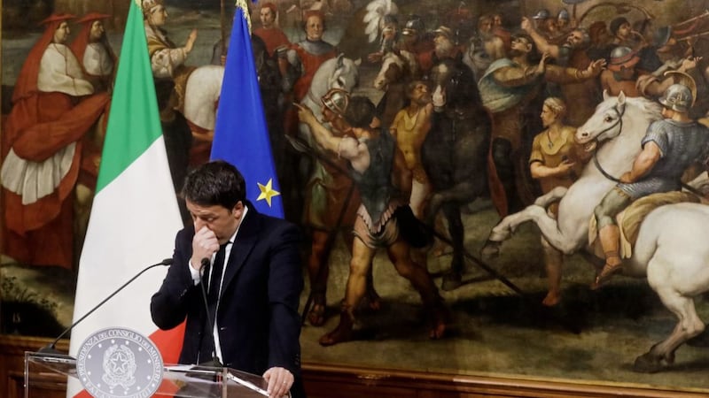 Italian Premier Matteo Renzi pauses as he speaks during a press conference at the premier's office Chigi Palace. Picture by Gregorio Borgia, Press Association