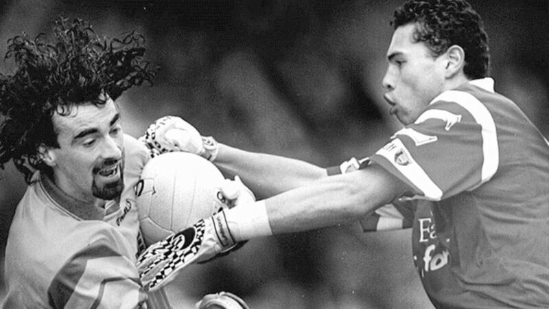 HAIR-RAISING ACTION... Donegal&rsquo;s Jim McGuinness comes under pressure from Cork&rsquo;s Sean Og hAilpin