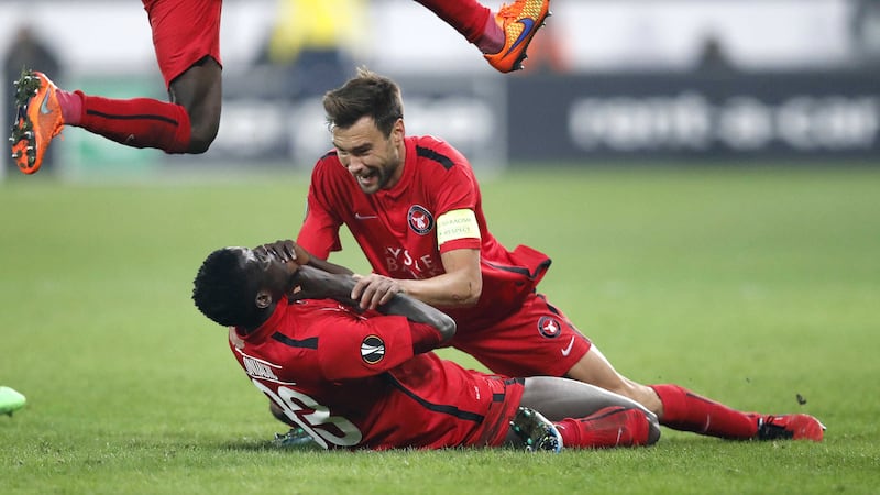 FC Midtjylland's Ebere Paul Onuachu (left) and Tim Sparvp celebrate at the end of their Europa League round-of-32 first leg against Manchester United at the MCH Arena in Herning, Denmark<br />Picture by AP&nbsp;