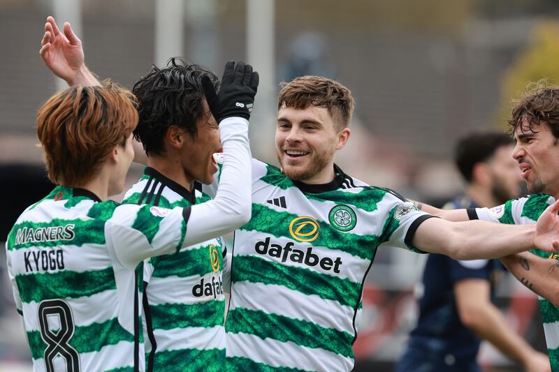 James Forrest (centre) celebrates scoring Celtic’s first goal
