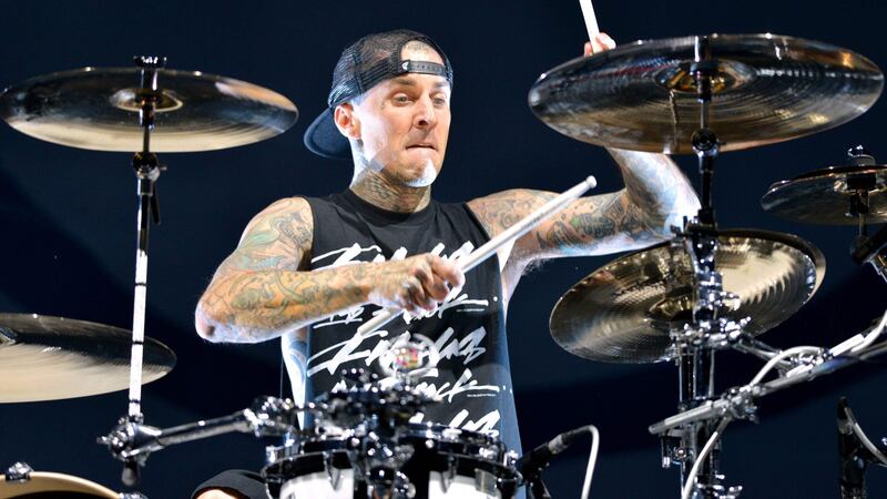 Travis Barker of Blink-182 was returning home to the US on Friday, leading to the band cancelling shows (Lewis Stickley/PA)