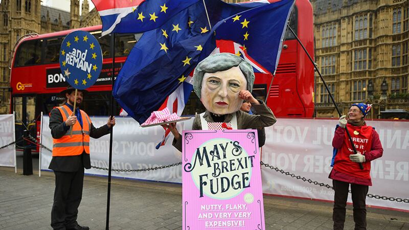 A demonstrator dressed as Theresa May sells Brexit Fudge in Old Palace Yard, Westminster&nbsp;