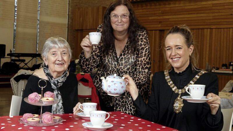 Last week, a group of service users from Volunteer Now&rsquo;s Befriending, Shopping and Driving scheme enjoyed an afternoon of chat and music in the Skainos Centre in east Belfast. Pictured are Beatrice McVeigh, volunteer Karen Hamilton and Lord Mayor Kate Nichol 