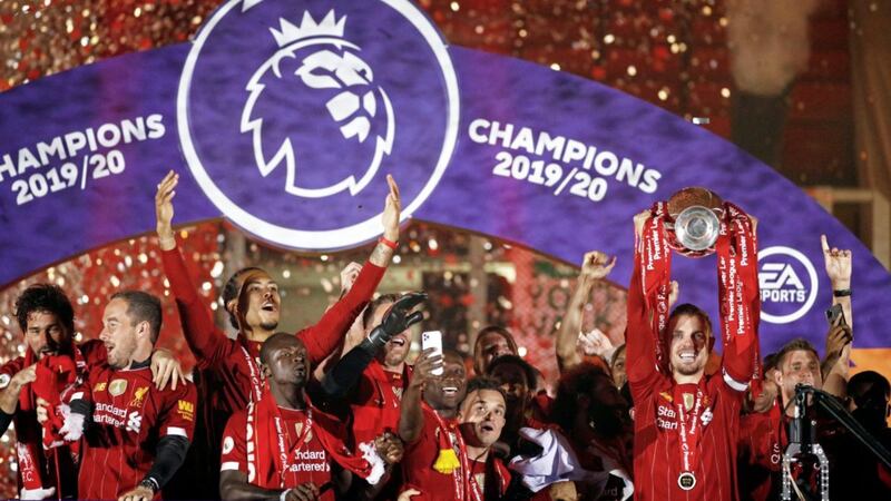 Jordan Henderson became the first Liverpool captain to get his hands on the Premier League trophy at the end of last season, and the Anfield club look well placed to defend their crown Picture by PA 