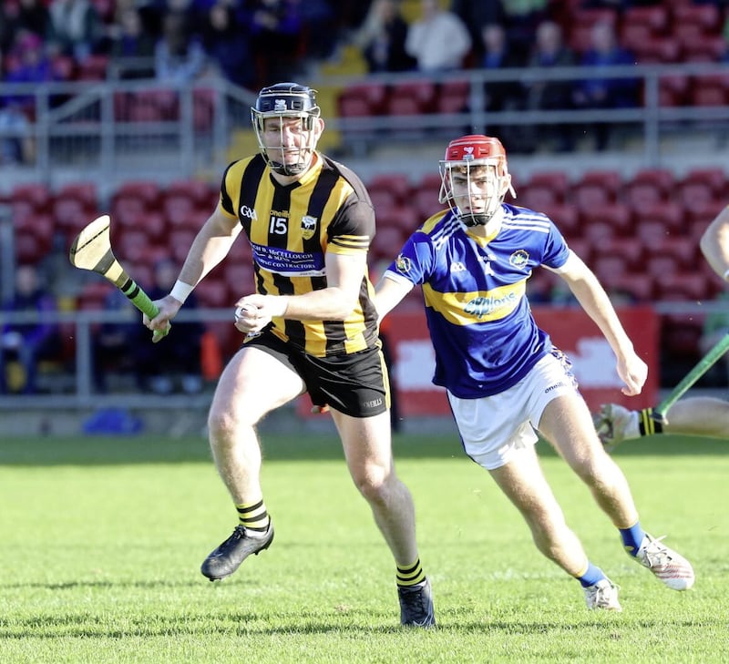 Ballycran&#39;s Christopher Egan and Portaferry&#39;s Ronan Smyth. Egan played the final days after his mother, Dawn, passed away Picture: Philip Walsh 