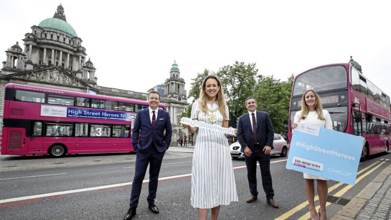 Belfast Lord Mayor Kate Nicholl lends her support to the Irish News/Retail NI High Street Heroes campaign. Looking on (from left) are Glyn Roberts (Retail NI chief executive), Translink&rsquo;s John Morgan and Irish News group marketing and communications manager Annette Small 