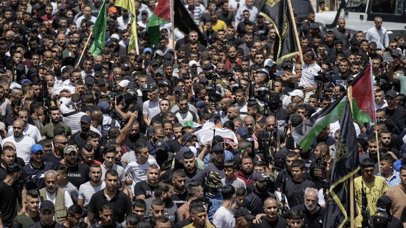 2022 has already been a deadlier year for Palestinians than 2021, which saw the highest number of Palestinian deaths at the hands of Israelis since 2014. Pictured is the funeral of three Palestinians shot dead by Israel forces in the West Bank town of Jenin in June. (AP Photo/Nasser Nasser). 