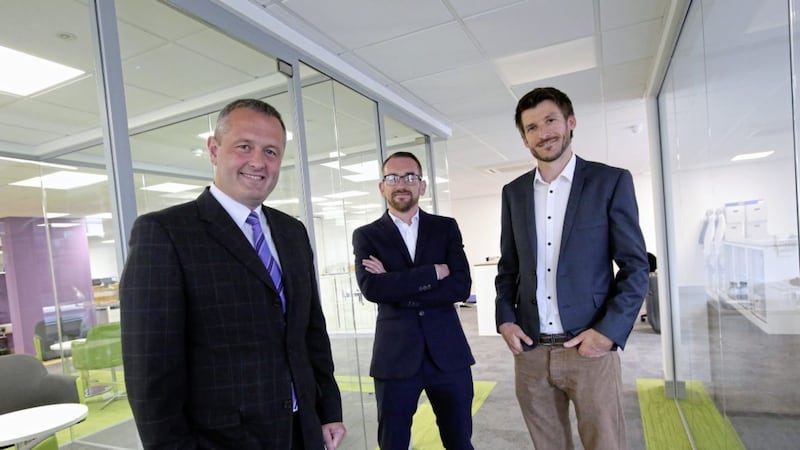 Jeremy Biggerstaff from Flint Studios (left), who have announced a major merger with Cheshire-based Link Information Technology. Also pictured are Link Technology directors Rob Antrobus and Neil Marshall 