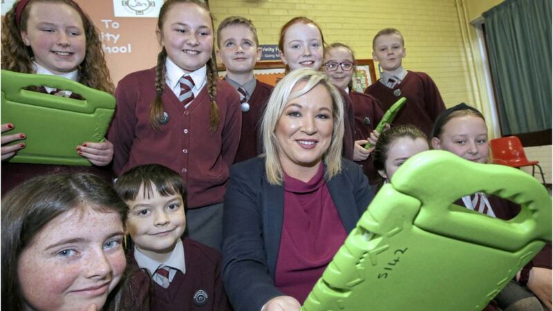 Deputy First Minister Michelle O&#39;Neill with pupils from Holy Trinity Primary School in West Belfast after the school won a Cyber Resilience and Internet Safety Award. Picture: Hugh Russell 