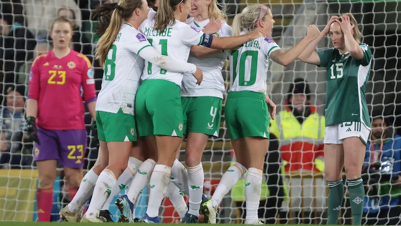 Republic of Ireland players celebrate their 6-1 rout of Northern Ireland.