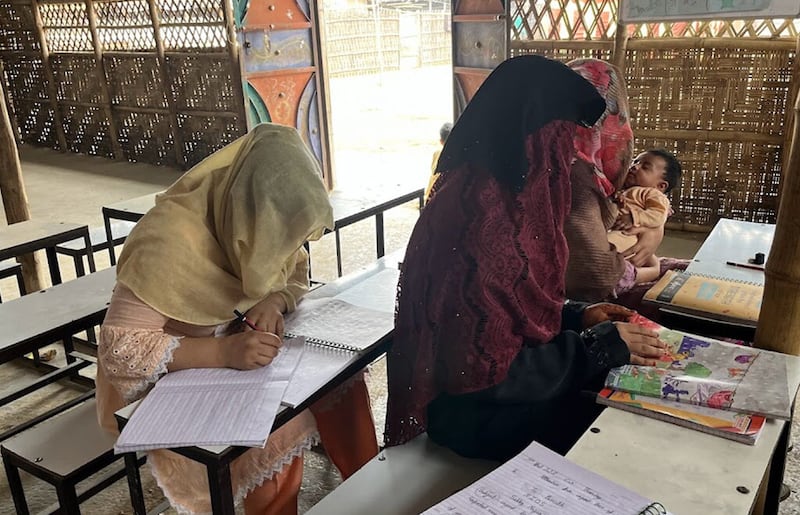 Rohingya youth take classes in a refugee camp in Mewat district, Haryana state. There are an estimated 40,000 Rohingya refugees in India. Image: courtesy of Geetanjali Krishna