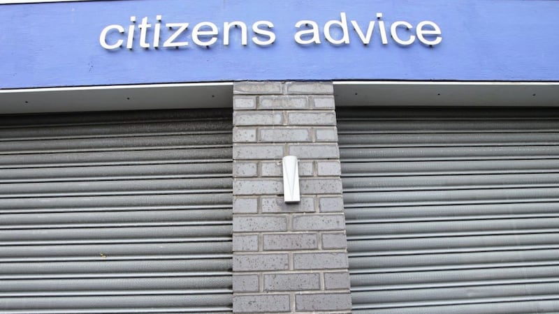 The shutters are permanently down on the Citizens Advice office on Donegal Pass. Picture by Mal McCann 