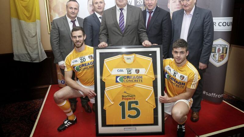 Pictured at an Antrim GAA kit launch are sponsors Seamus and Gerard McKeague from Creagh Concrete (right). The company has grown its turnover by 15 per cent in the past year 