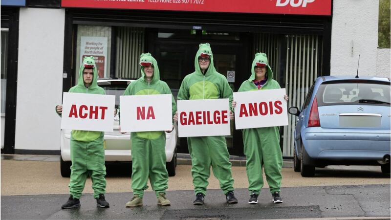 Members of Sinn F&eacute;in Republican Youth protesting for an Irish language act outside Nelson McCausland&#39;s office in north Belfast. Picture by Hugh Russell 