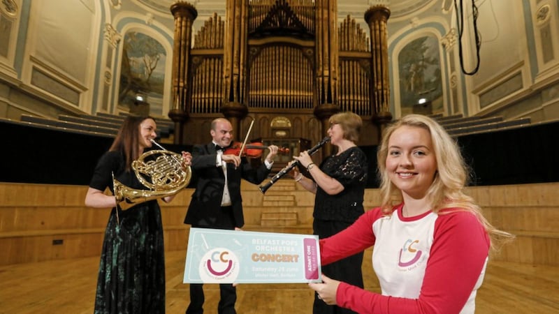 Orchestra members, Laura Salt, Stephen Cullen and Gillian McCutcheon are joined by Anna McDonald from The Children&#39;s Cancer Unit Charity to launch the Belfast Pops Orchestra performance at the Ulster Hall on June 25 