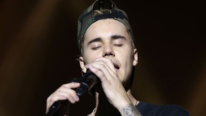 Justin Bieber told the crowd he had medicine ‘stuck in my nose’.