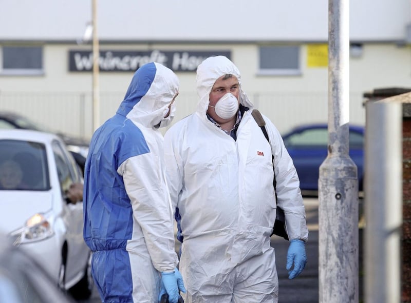 Police and forensic teams at the scene of the murder in east Belfast. Picture Mal McCann. 
