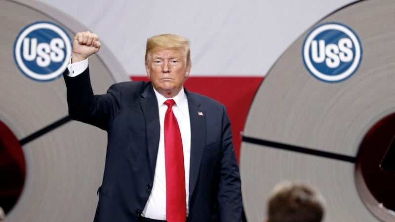 President Donald Trump acknowledges the audience after speaking at the United States Steel Granite City Works plant on Thursday. Picture by Jeff Roberson, Associated Press 