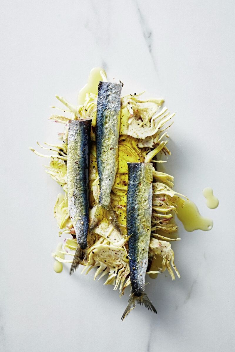 Salted sardines on toast with artichoke hearts from TAKE ONE FISH: The New School of Scale-to-Tail Cooking and Eating by Josh Niland