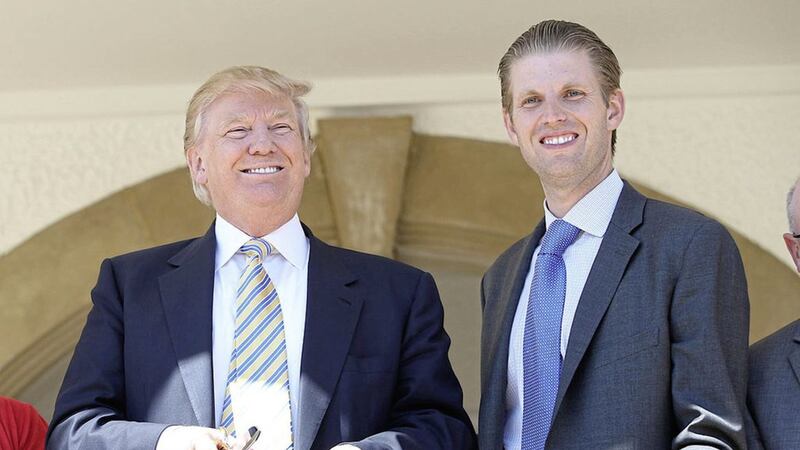 Eric Trump (right) pictured with father and US President Donald Trump has said a hard border in Ireland would &quot;set the country back&quot; 