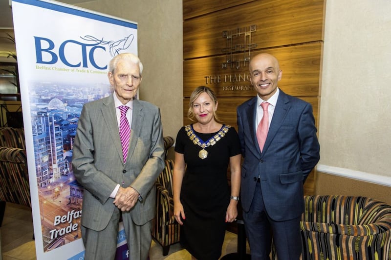 BUSINESS MEMORIES: Flashback to when Belfast Chamber president Michelle Greeves welcomes Rajesh Rana into the role, with Irish News chairman and Chamber stalwart Jim Fitzpatrick looking on 
