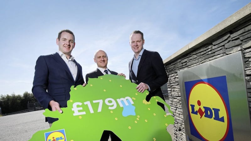 Lidl Ireland managing director, JP Scally, Neil McCullough, Oxford Economics and Conor Boyle, Lidl NI director 