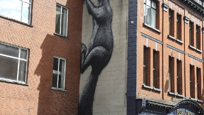A giant squirrel painted on the side of the Irish News building in Donegall Street, created by Belgian artist R.O.A. Picture by Hugh Russell