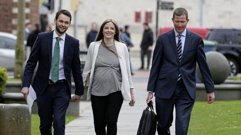Daniel McArthur (left) and his wife Amy, alongside Sam Webster, The Christian Institute&#39;s solicitor advocate outside court in May 