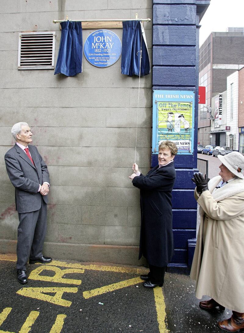 The unveiling of the blue plaque to John McKay by Philomena McConvey and Doreen Corcoran from the Ulster History Circle with Irish News Chairman Jim Fitzpatrick