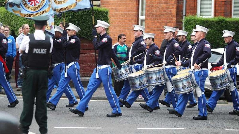 The controversial loyalist parade off Ormeau Road to commemorate UDA man Joe Bratty and Raymond Elder. Picture by Matt Bohill 