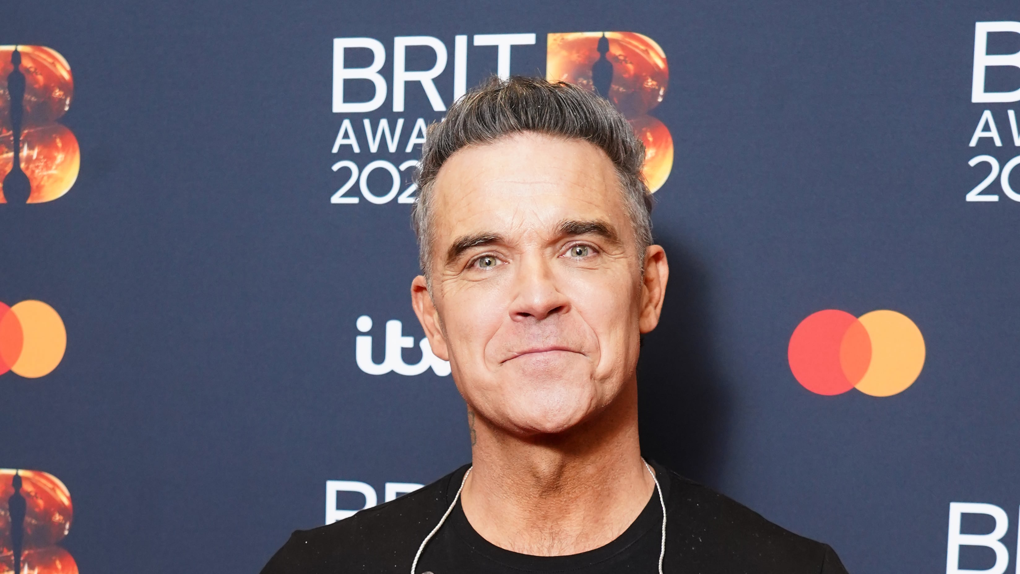Robbie Williams’ logo will appear on shirts for his hometown football club