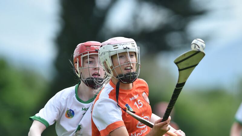 Armagh's Rachel Merry wins the sliothar ahead of Limerick's Ann Hayes during the Glen Dimplex All-Ireland Premier Junior Championship Group One match in Bruff<br />Picture: John Merry&nbsp;