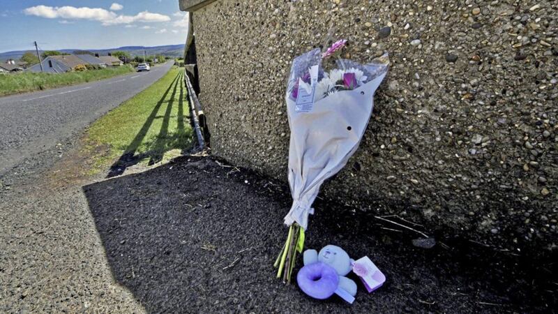 Flowers and tributes at the scene in Ballycastle yesterday. Picture by Hugh Russell 