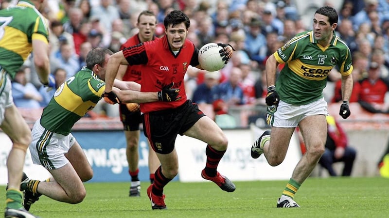 Marty Clarke finds himself under pressure from Kerry&#39;s Mike McCarthy and Bryan Sheehan in Down&#39;s 2010 All-Ireland quarter-final win over the Kingdom. Picture by Seamus Loughran 