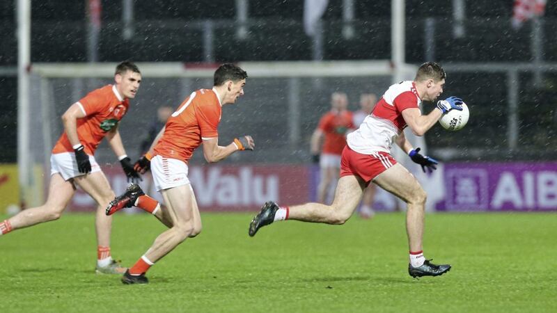 Rory Grugan (middle) and Ciaran McFaul (on the ball) both had superb games. Picture by Margaret McLaughlin 
