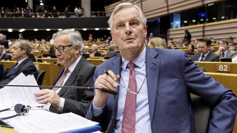 European Union chief Brexit negotiator Michel Barnier (right) and former EU Commission President Jean Claude Juncker. Picture by AP Photo/Geert Vanden Wijngaert 