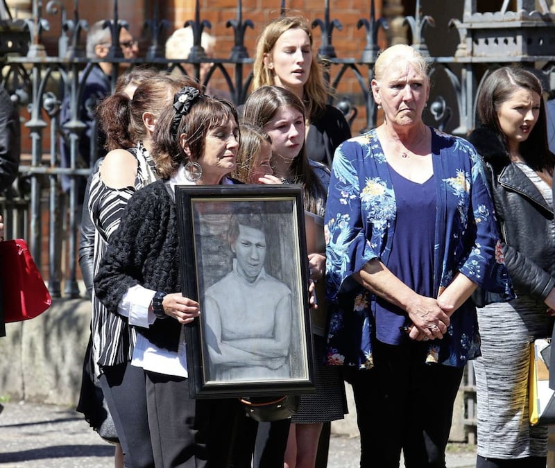 Helen McKendry, right, at the funeral of her brother Billy McConville. Picture by Mal McCann 