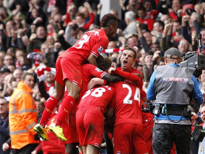 Liverpool players celebrate after Philippe Coutinho scores