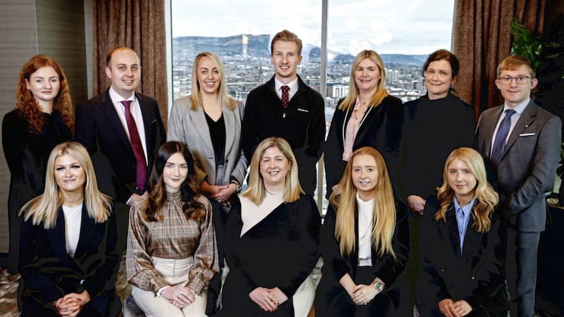 Julie Galbraith, executive partner of DWF in Belfast, with some of the new recruits 