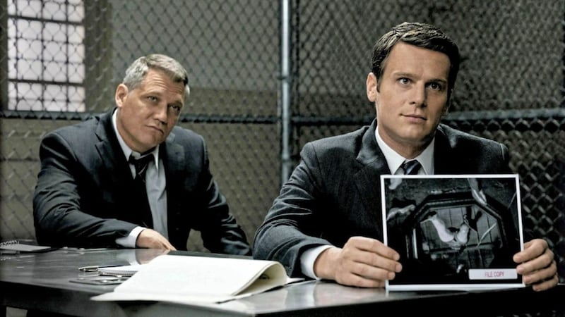 Bill Tench (Holt McCallamy) and Holden Ford (Jonathan Groff) are on the case of serial killers in Mindhunter 