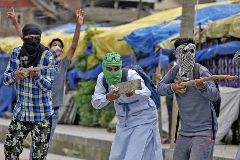 Protesters confront Indian police in Srinagar, Jammu and Kashmir Picture: Cathal McNaughton/Reuters 