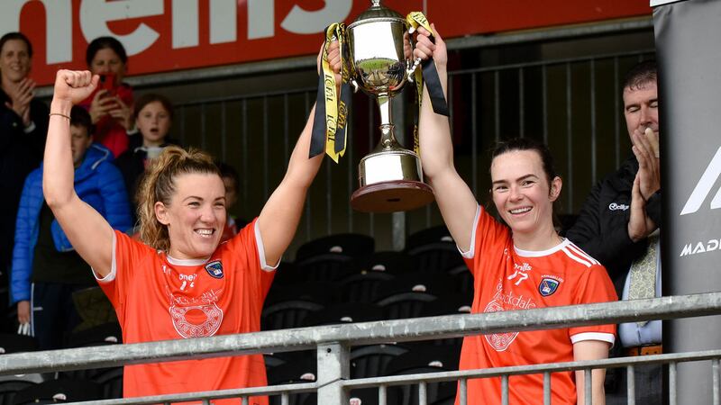 <span style="font-family: Calibri, sans-serif; ">Armagh captain Kelly Mallon (left) lifts the Ulster LGFA O'Harte cup with vice-captain Sarah Marley <br />Picture: Brendan Monaghan</span>