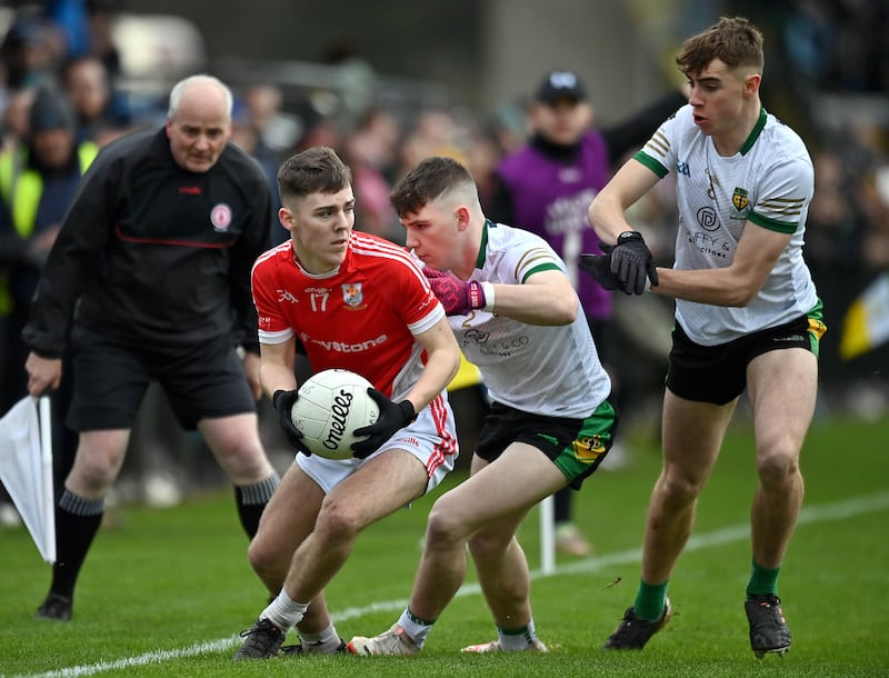 Saturday 27th January 2024
Lorcan Hegarty of St Patricks Academy Dungannon in action against Caolan Quinn and Conor O’Neill of St Josephs Grammar Donaghmore in the MacRory Cup semi final at Carrickmore, Co. Tyrone.  Pictures Oliver McVeigh
