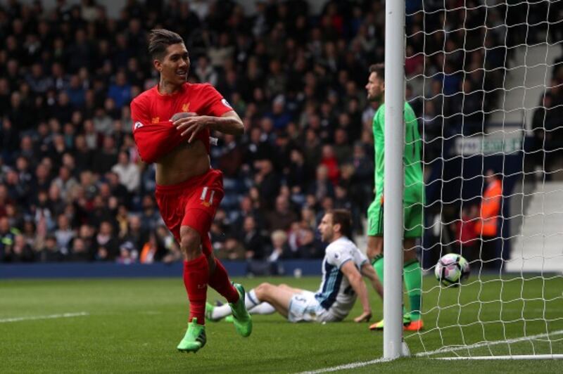 Liverpool's Roberto Firmino celebrates scoring his side's first goal of the game 