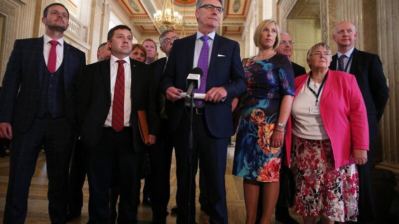 UUP leader Mike Nesbitt and party colleagues at Stormont. Picture by Mal McCann 